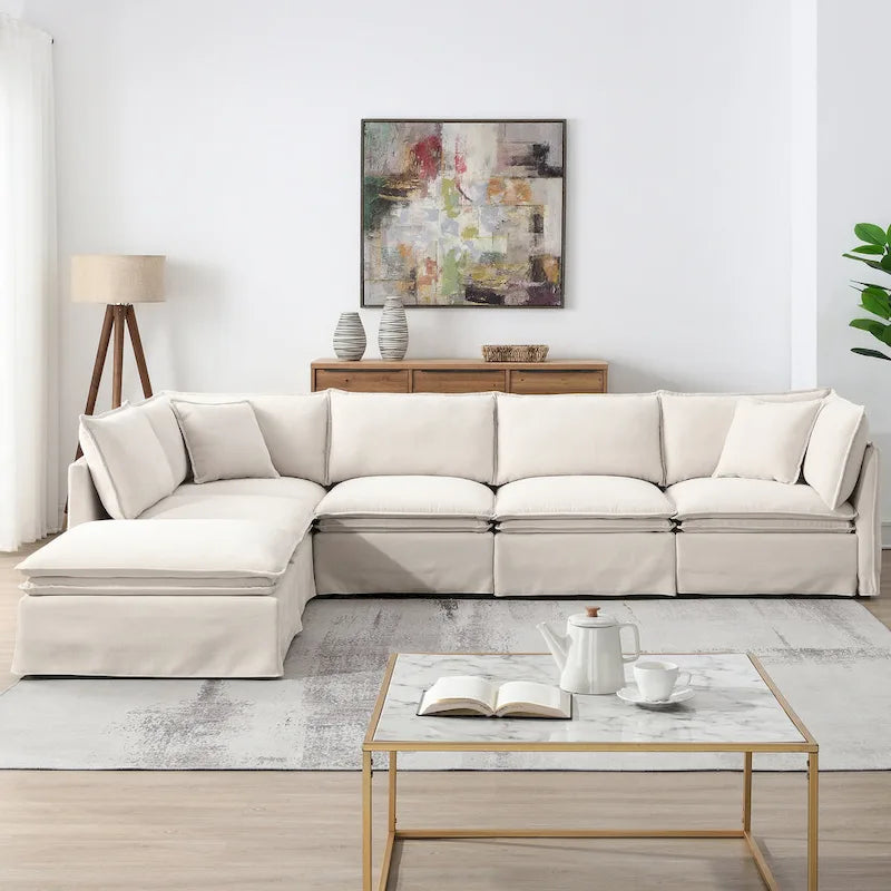 Divano sezionale modulare a L in ciniglia con pouf mobile