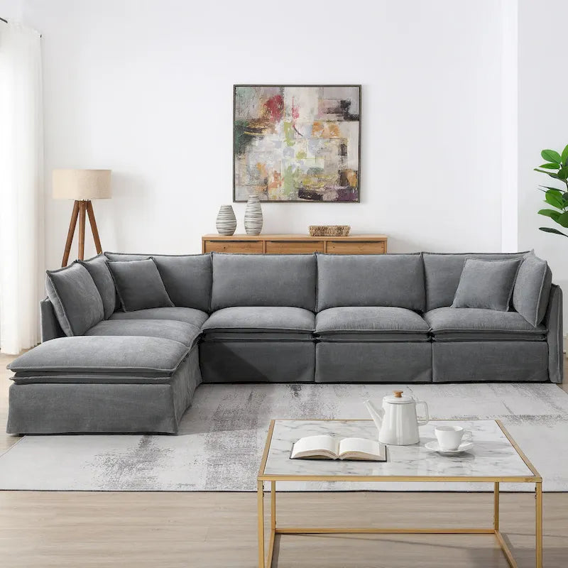 Divano sezionale modulare a L in ciniglia con pouf mobile